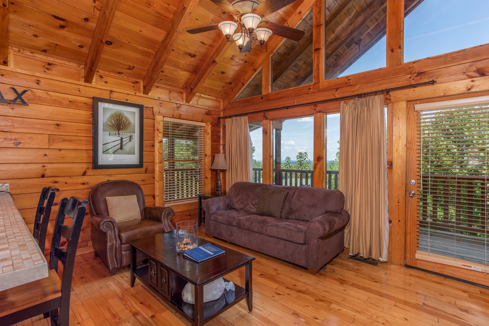 Seating area off the main living room at Majestic Sunrise, a 1 bedroom cabin rental located in Pigeon Forge