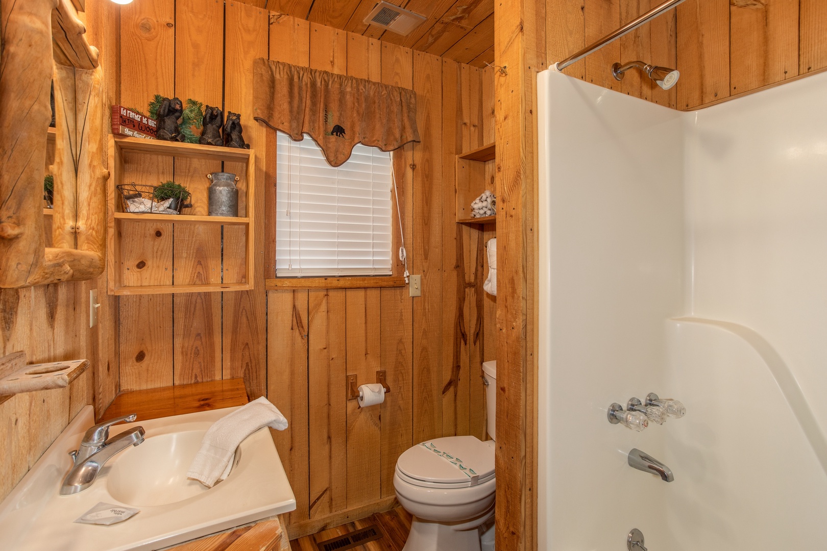 Bathroom with a tub and shower at Papa Bear, a 3 bedroom cabin in Pigeon Forge