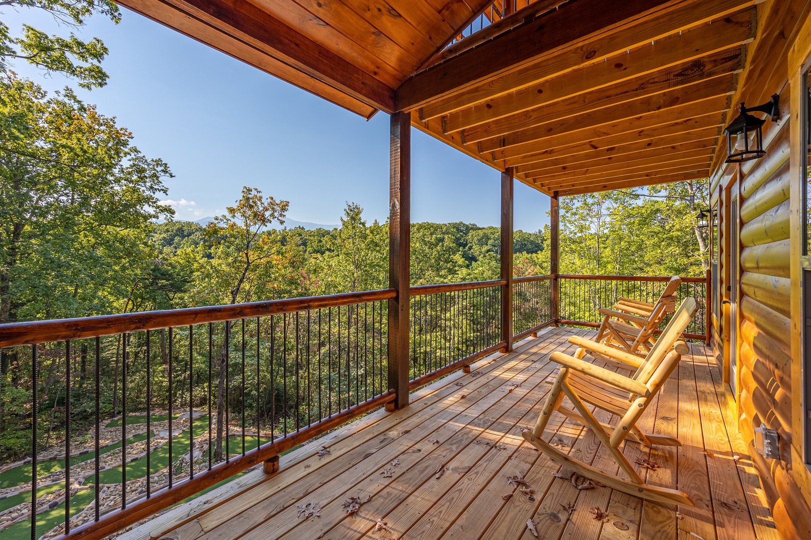 Covered Deck with Rocking Chairs at Make A Splash, a 2 bedroom cabin rental located in gatlinburg