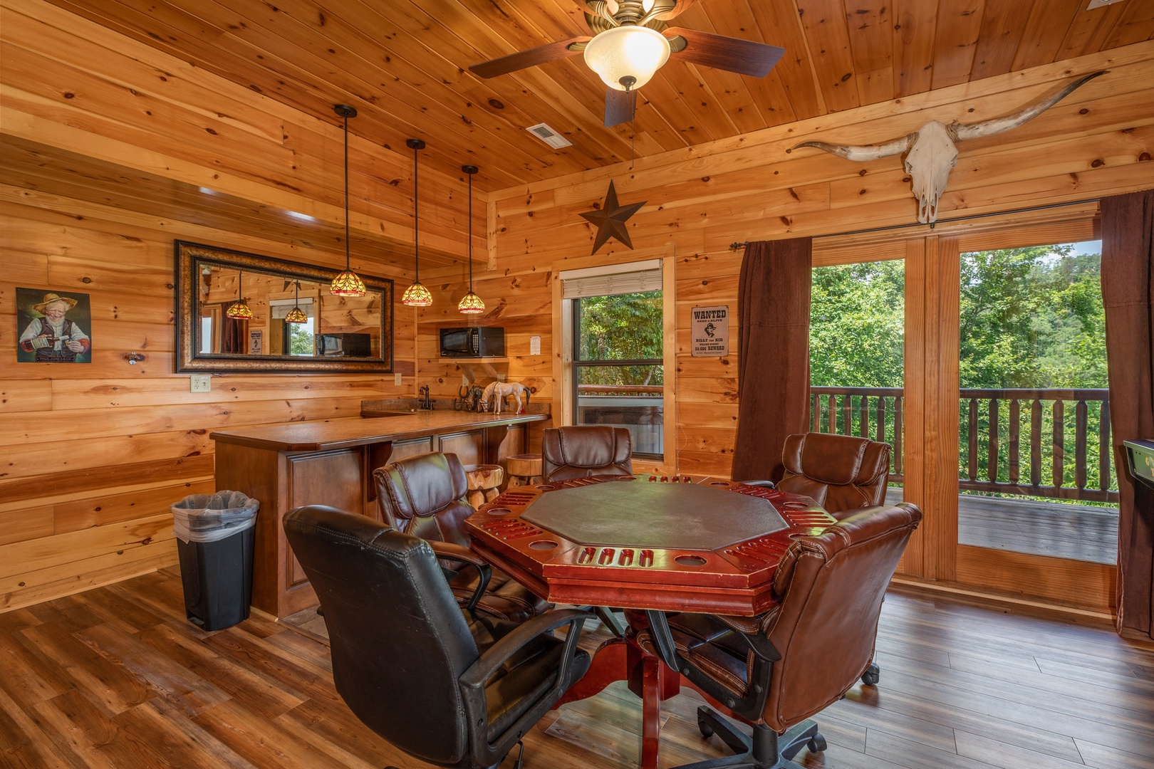 Poker table and bar at God's Country, a 4 bedroom cabin rental located in Pigeon Forge