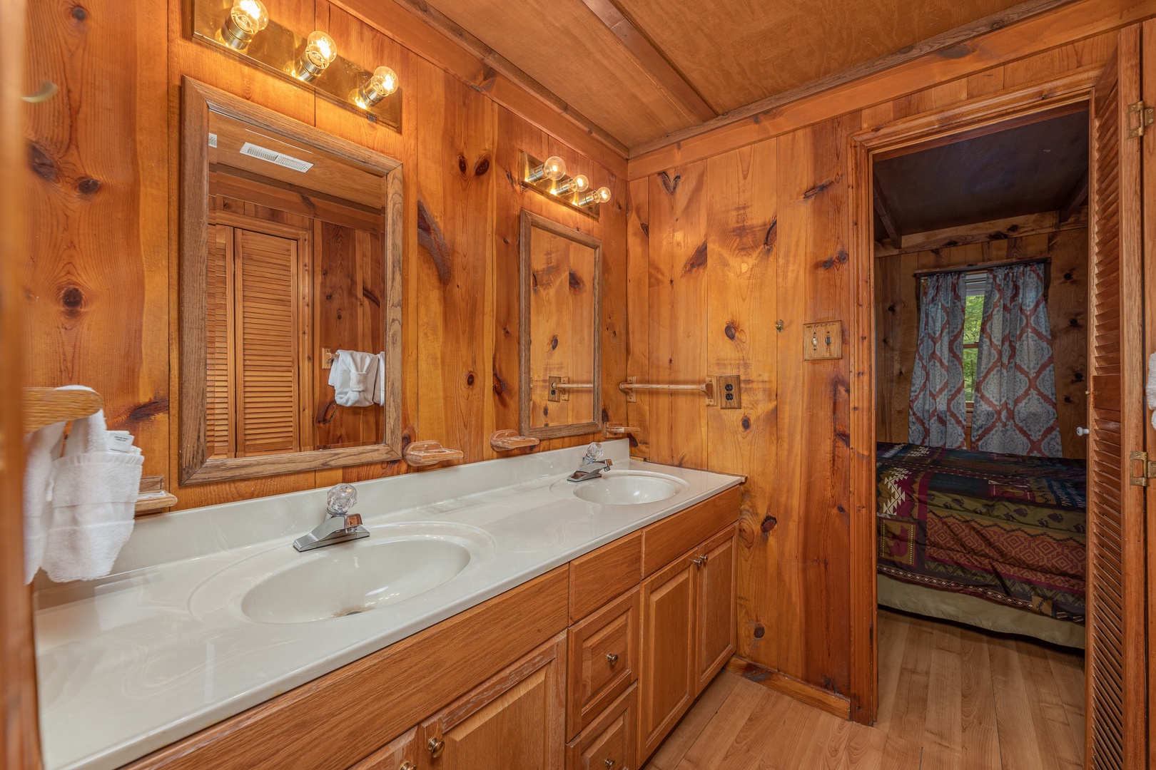 Double vanity sink at Heavenly Hideaway, a 2-bedroom cabin rental located in Gatlinburg