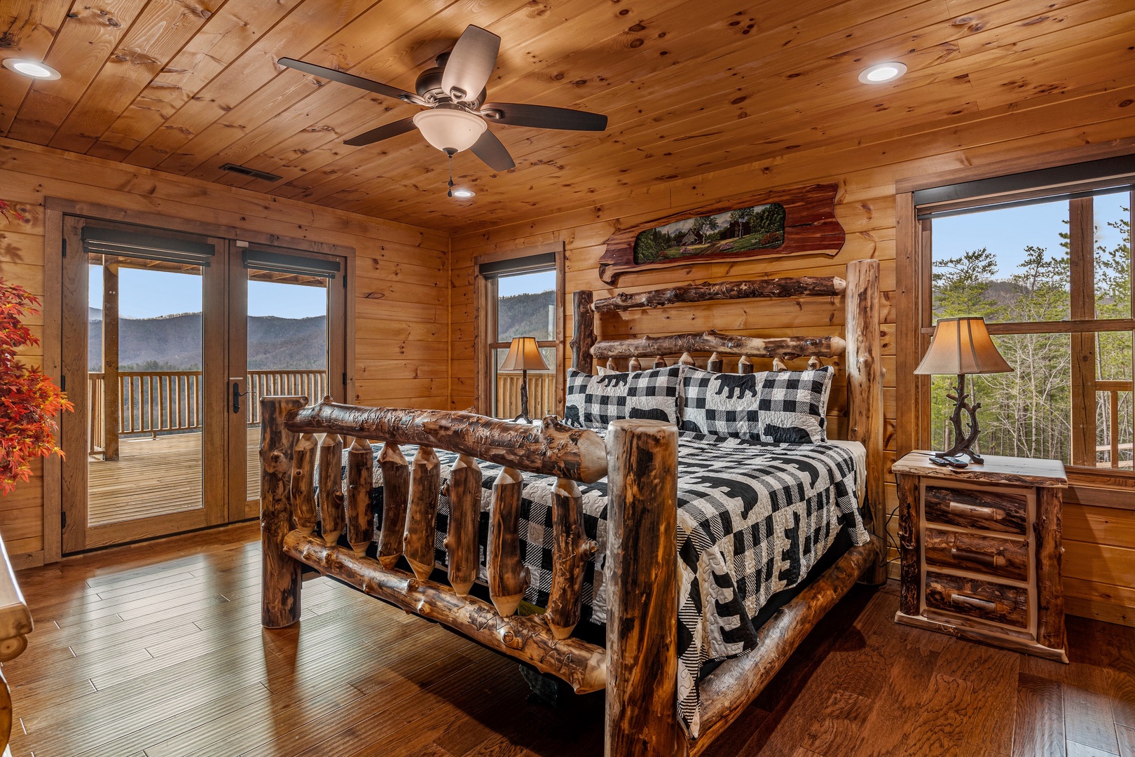 King log bedroom with mountain view at Four Seasons Grand, a 5 bedroom cabin rental located in Pigeon Forge