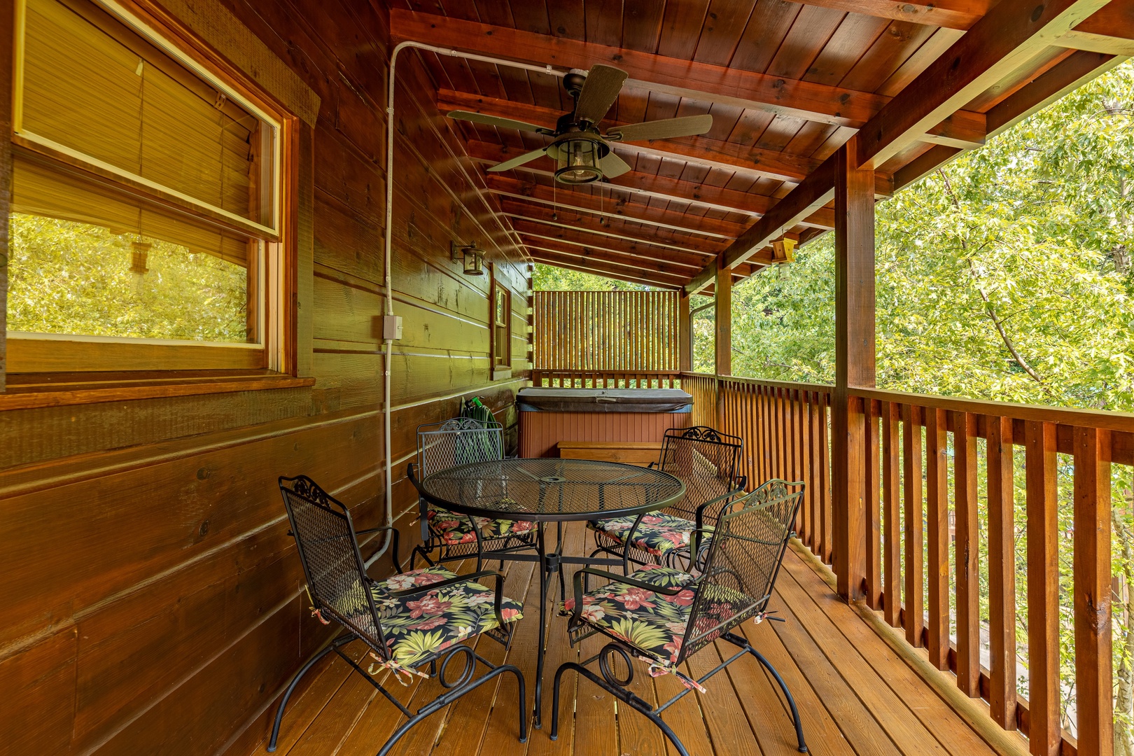 Outdoor dining for 4 at Livin' Simple, a 2 bedroom cabin rental located in Pigeon Forge