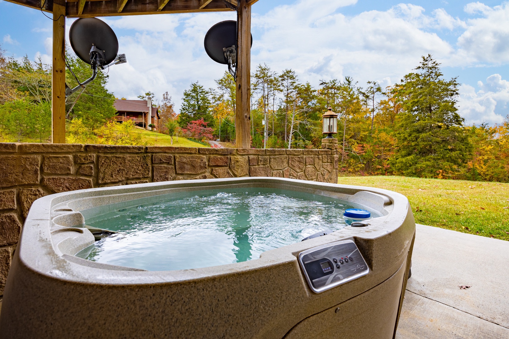 Hot tub at Mountain Lake Getaway, a 3 bedroom cabin rental located in douglas lake