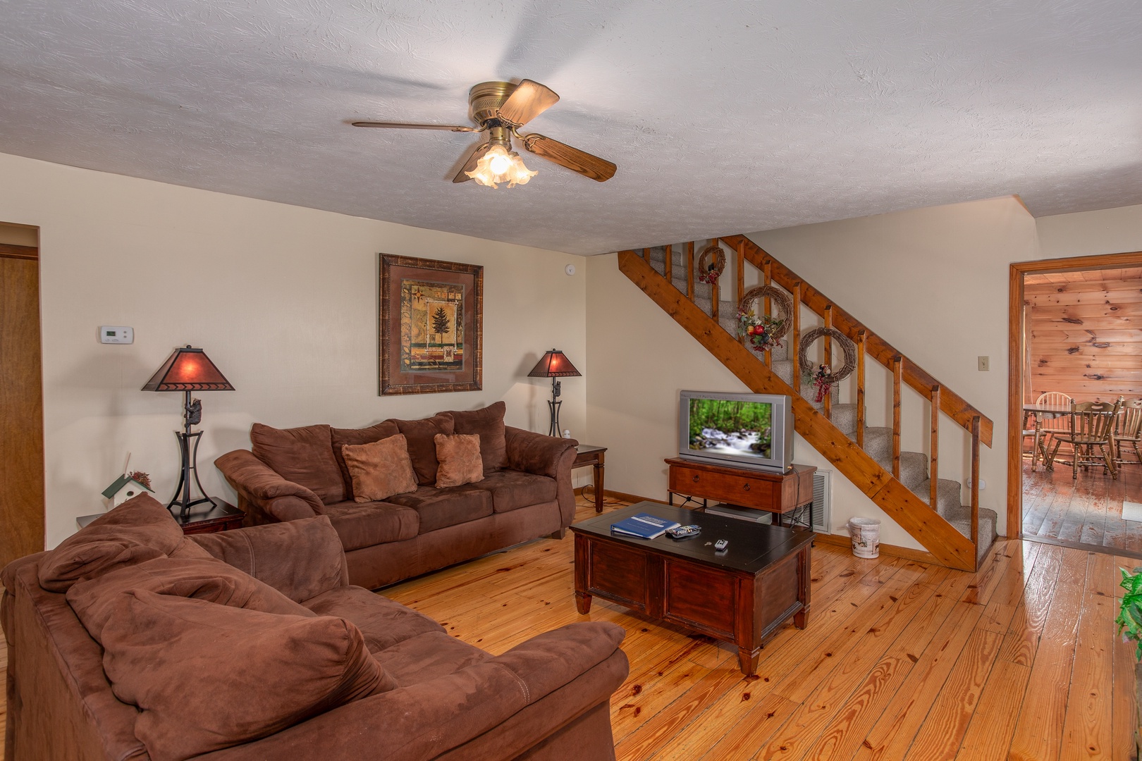 Living room with a sofa and loveseat at Black Bear Ridge, a 3-bedroom cabin rental located in Pigeon Forge