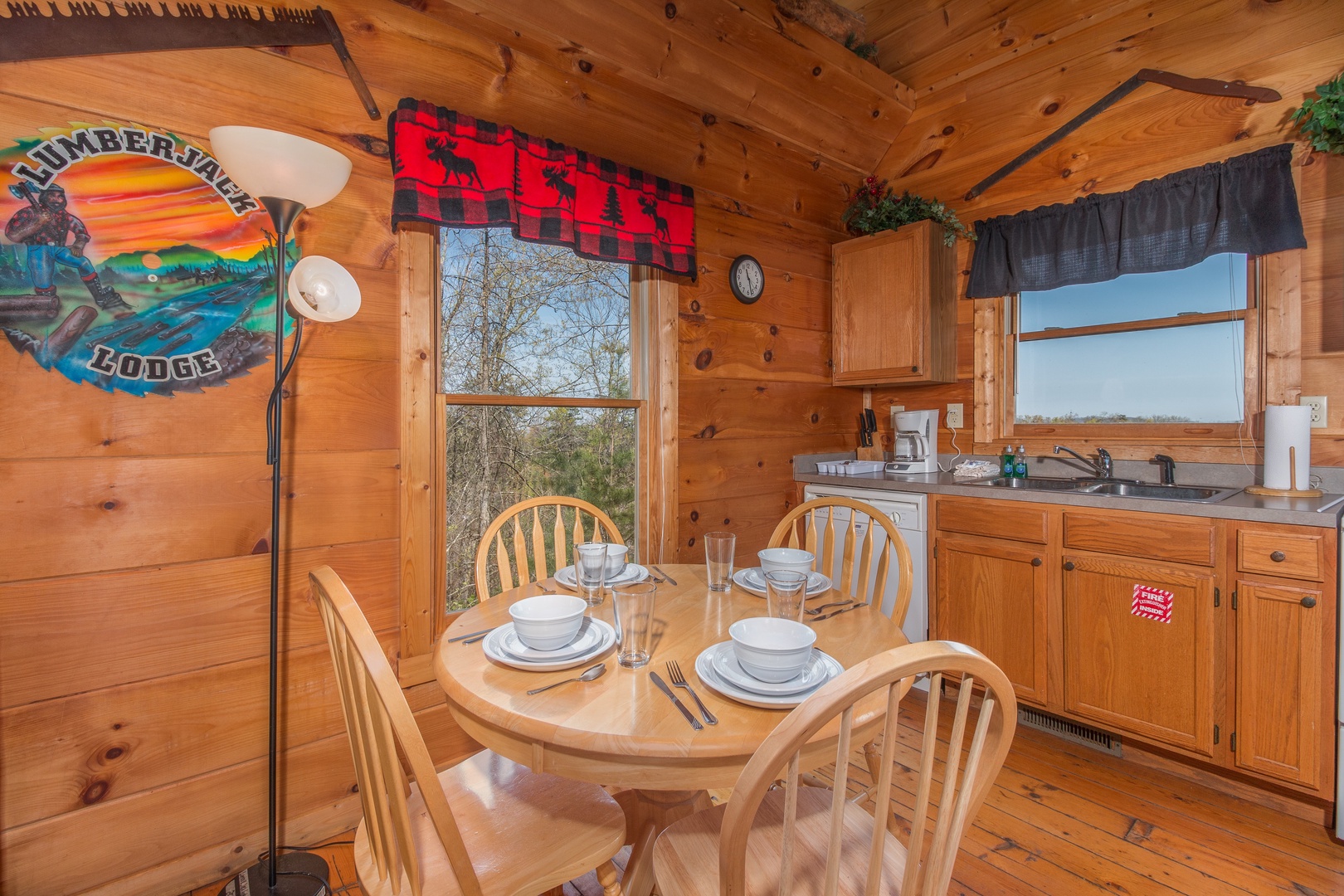 Dining table for four at Lumber Jack Lodge, a 1 bedroom cabin rental located in Gatlinburg