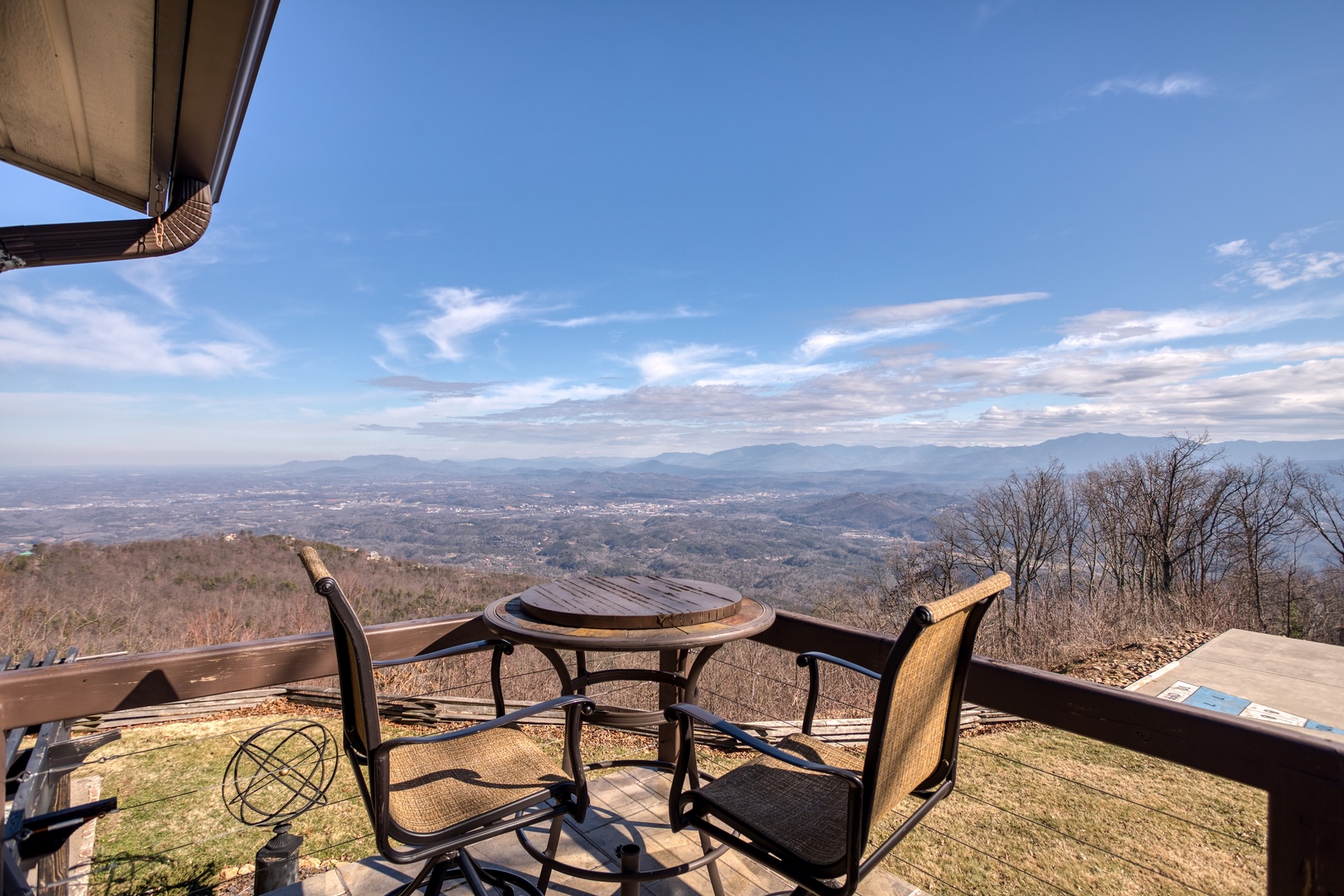 Deck dining overlooking the view at Best View Ever! A 5 bedroom cabin rental in Pigeon Forge