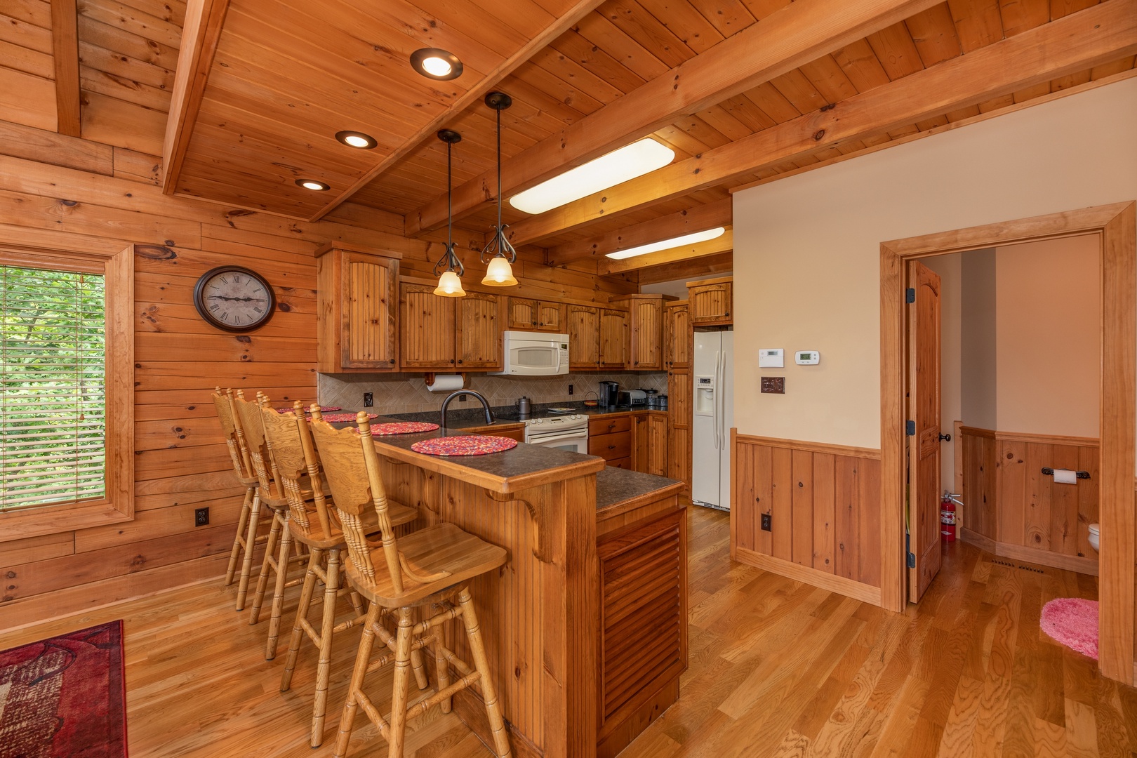 Breakfast bar with four chairs at Mountain Lake Getaway, a 3 bedroom cabin rental located at Douglas Lake