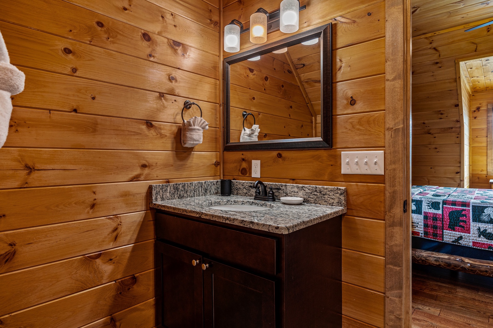 Loft bathroom sink and lighting at Four Seasons Grand, a 5 bedroom cabin rental located in Pigeon Forge