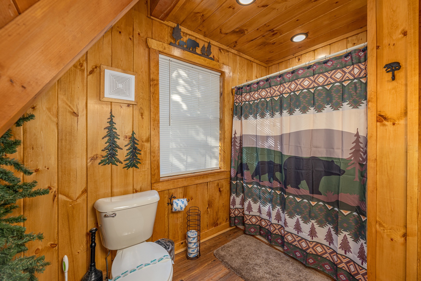 Main floor bathroom at Cozy Mountain View, a 1 bedroom cabin rental located in Pigeon Forge