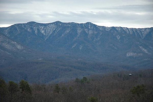 Snow capped mountain tops seen from 5 Star View, a 3 bedroom cabin rental located in Gatlinburg
