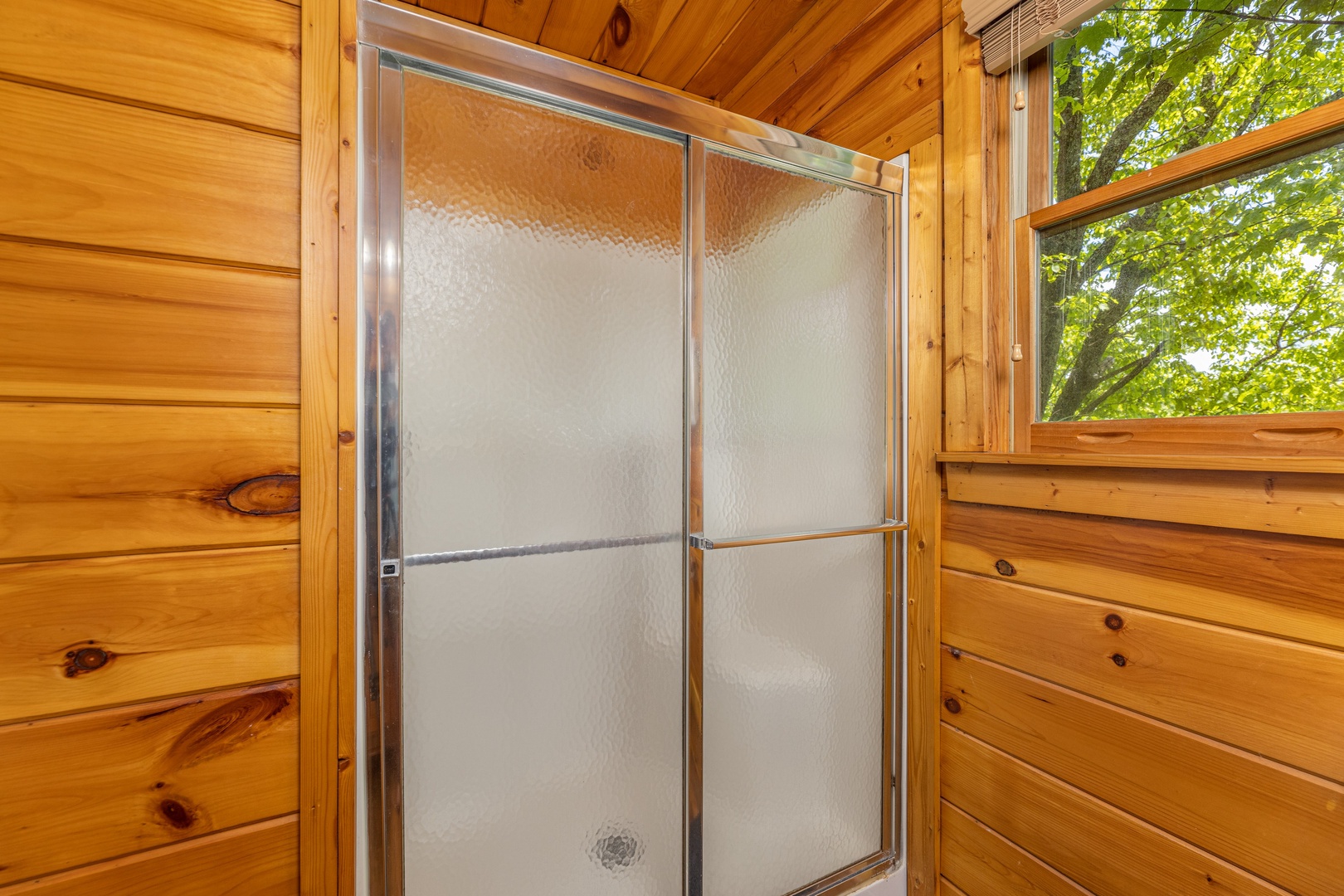 Bathroom with a shower at Moonlit Pines, a 2 bedroom cabin rental located in Pigeon Forge