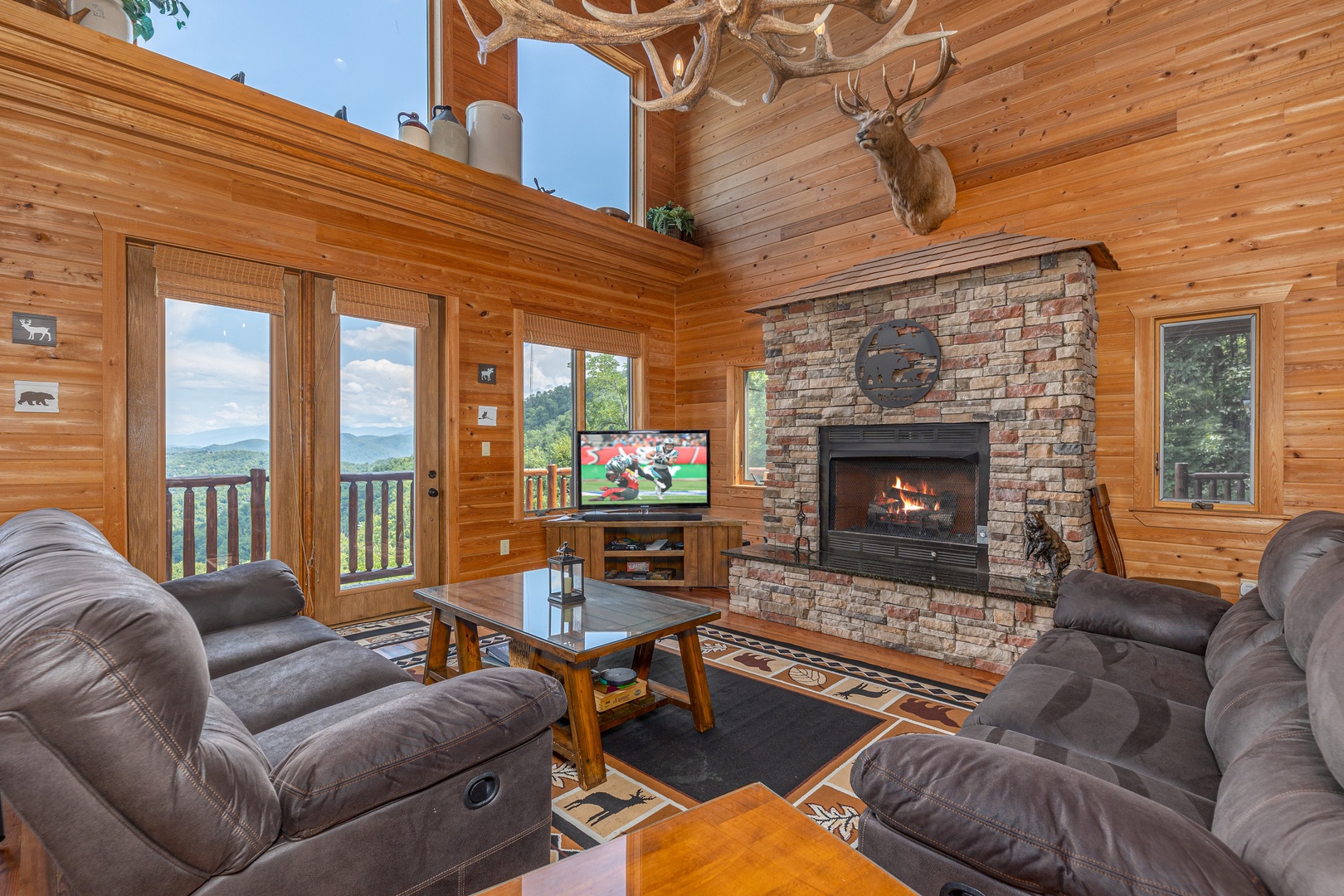 Living room view of fireplace at Sky View, A 4 bedroom cabin rental in Pigeon Forge