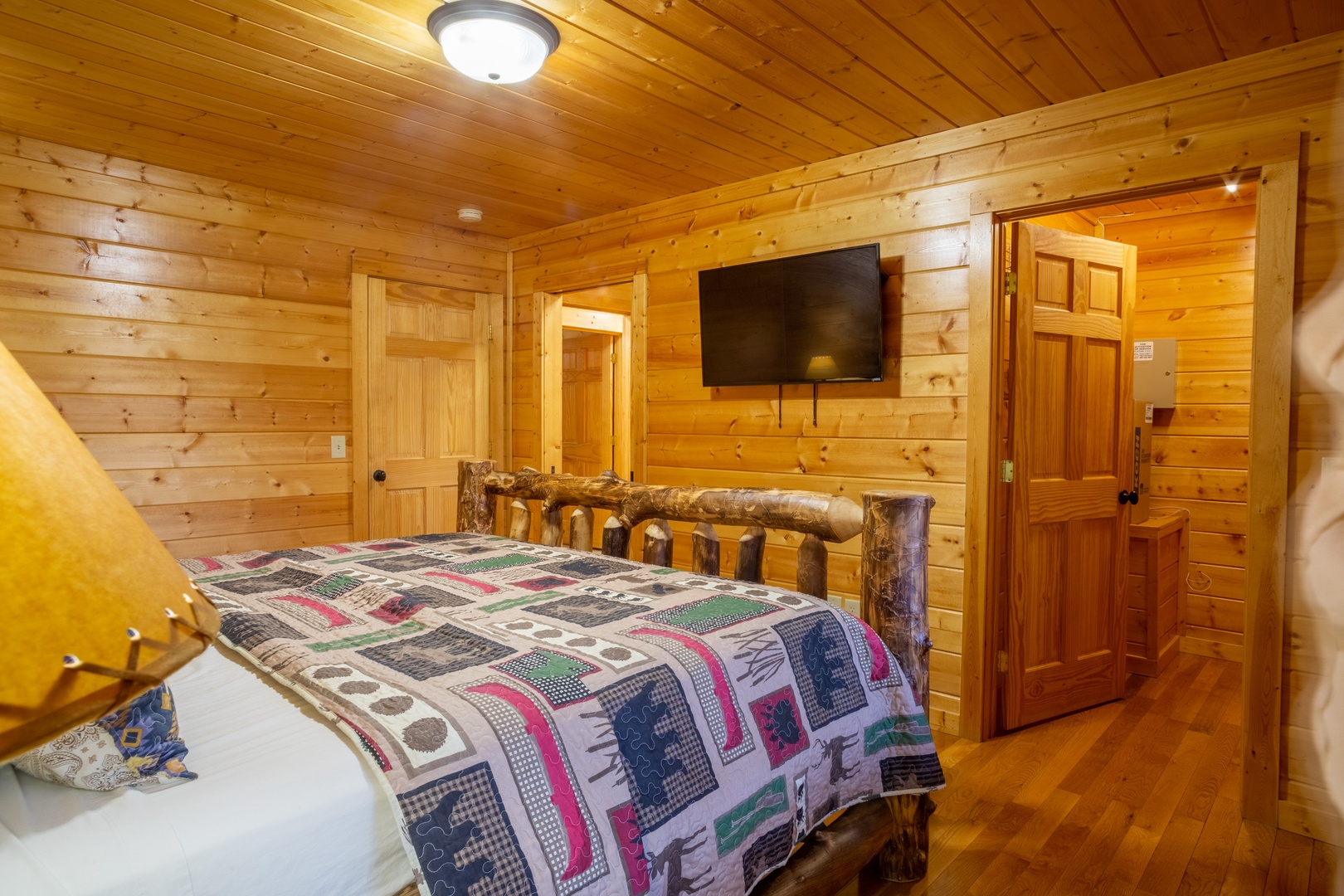 Flats screen tv in bedroom at 3 Crazy Cubs, a 5 bedroom cabin rental located in pigeon forge