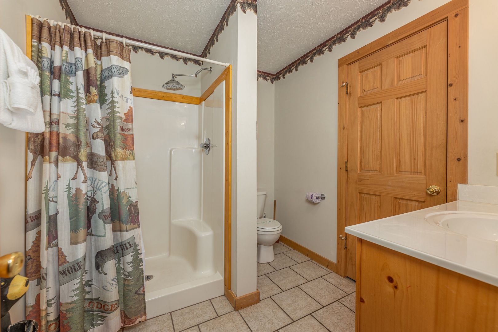 Bathroom with a walk in shower at Cub's Crossing, a 3 bedroom cabin rental located in Gatlinburg