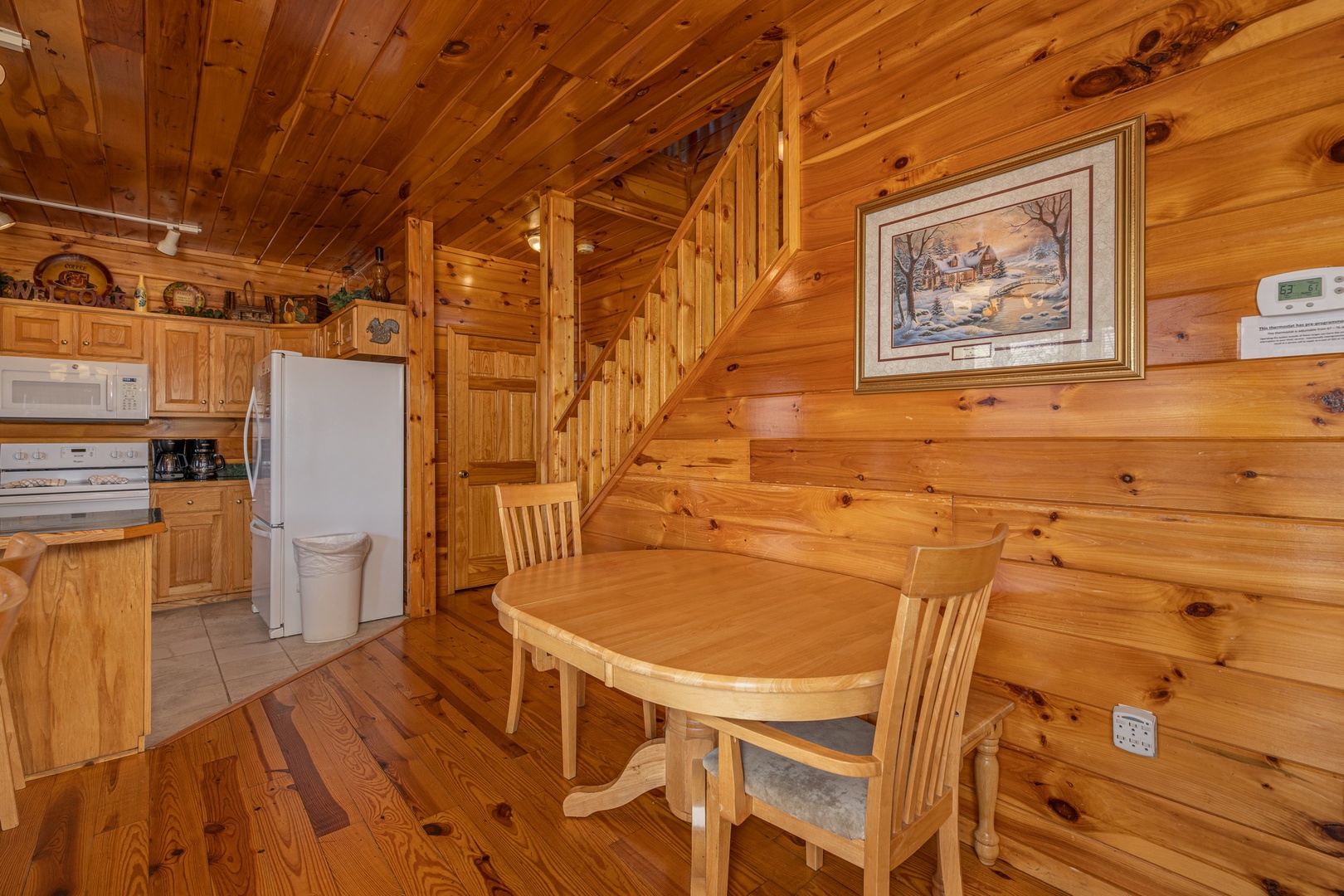 Dining table for two at Hickernut Lodge, a 5-bedroom cabin rental located in Pigeon Forge