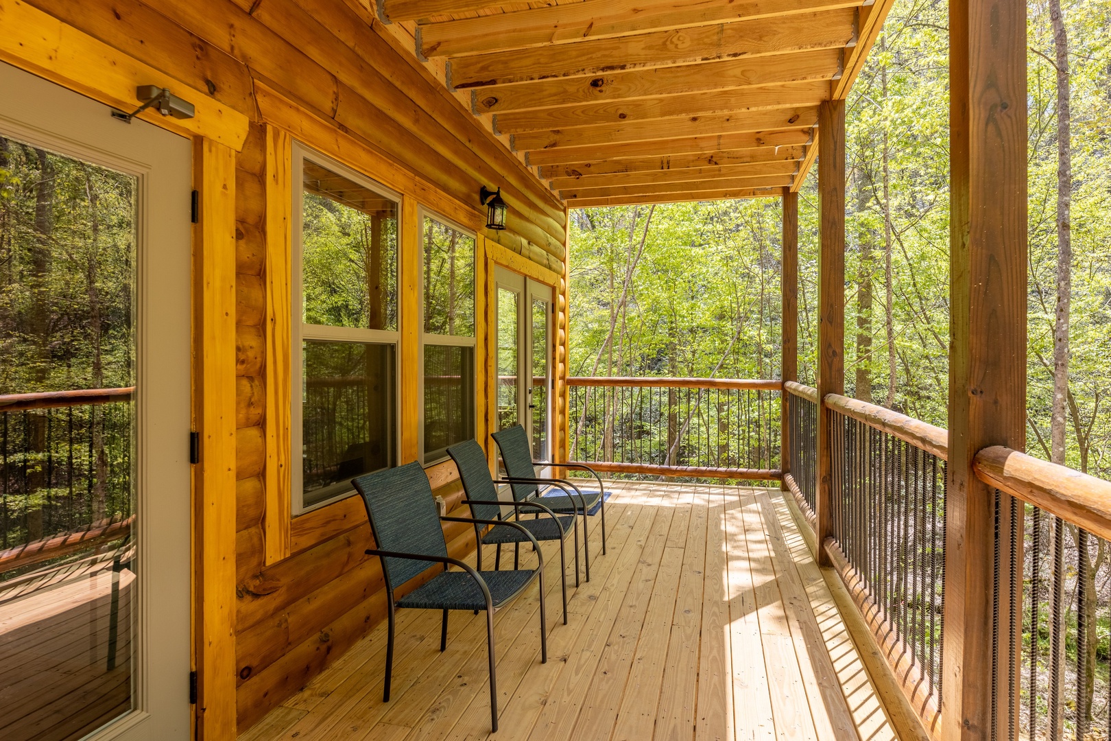 Deck seating at Poolin Around, a 2 bedroom cabin rental located in gatlinburg
