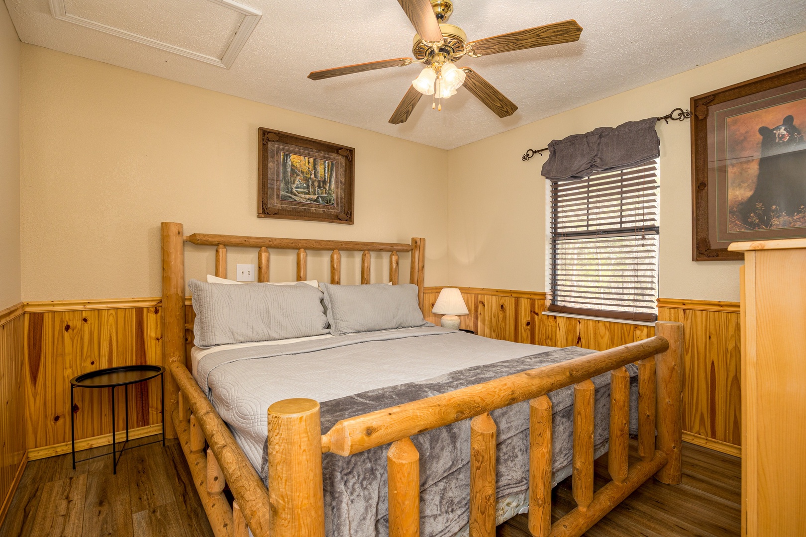 Log bed at Liam's Lookout, a 2 bedroom cabin rental located in Pigeon Forge