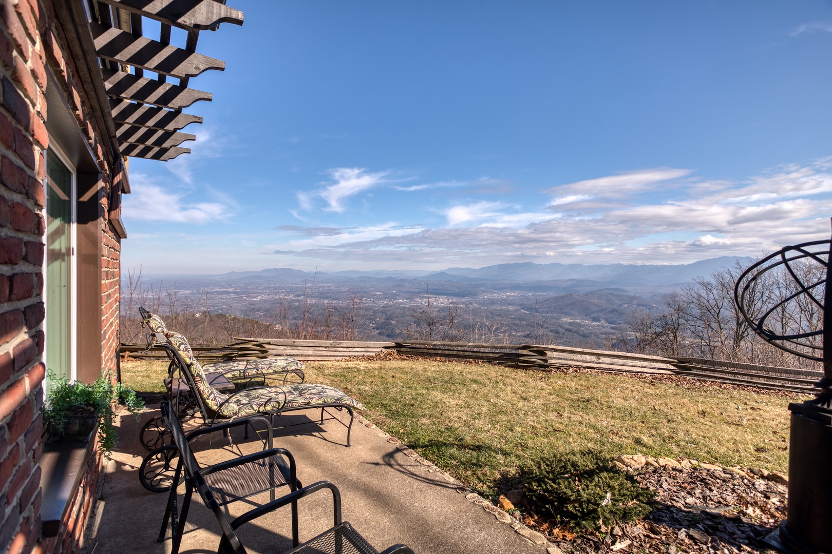 Lounge chairs on the back patio at Best View Ever! A 5 bedroom cabin rental in Pigeon Forge
