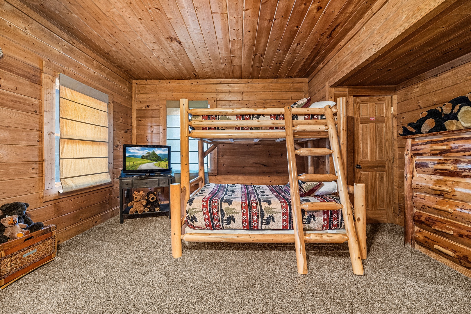 Bedroom with wooden Bunkbeds at A Beary Nice Cabin, a 2 bedroom cabin rental located in Pigeon Forge