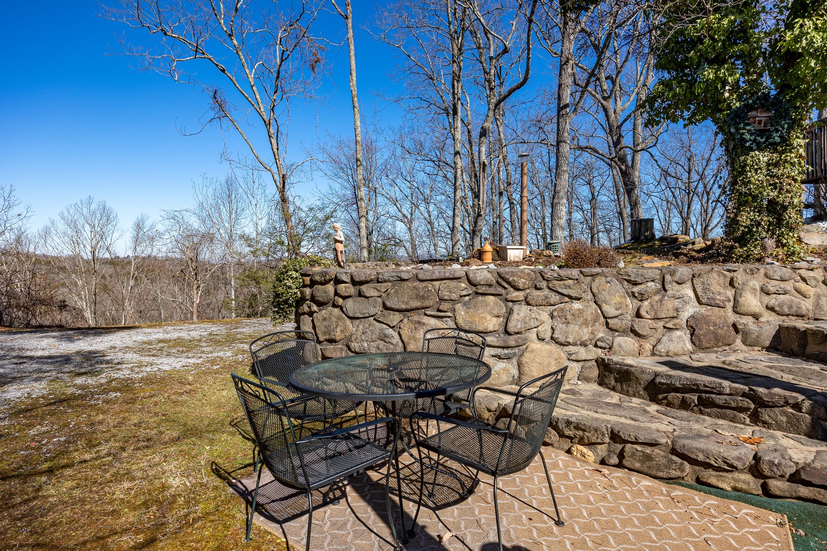 Outdoor iron patio table for 4 at Ever After, a 1 bedroom cabin rental located in Gatlinburg