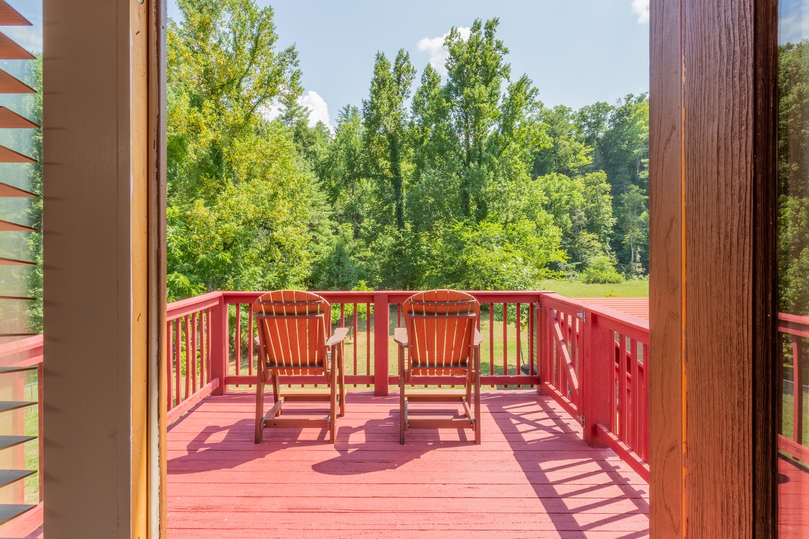 Seating on the deck at 1 Crazy Cub, a 4 bedroom cabin rental located in Pigeon Forge