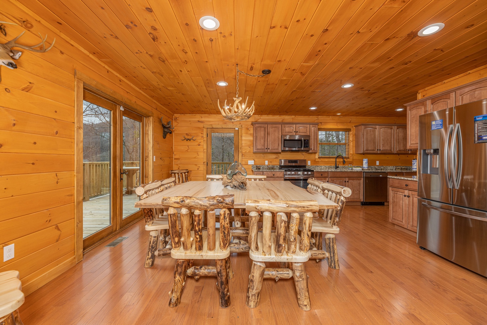 Dining room and kitchen at J's Hideaway, a 4 bedroom cabin rental located in Pigeon Forge