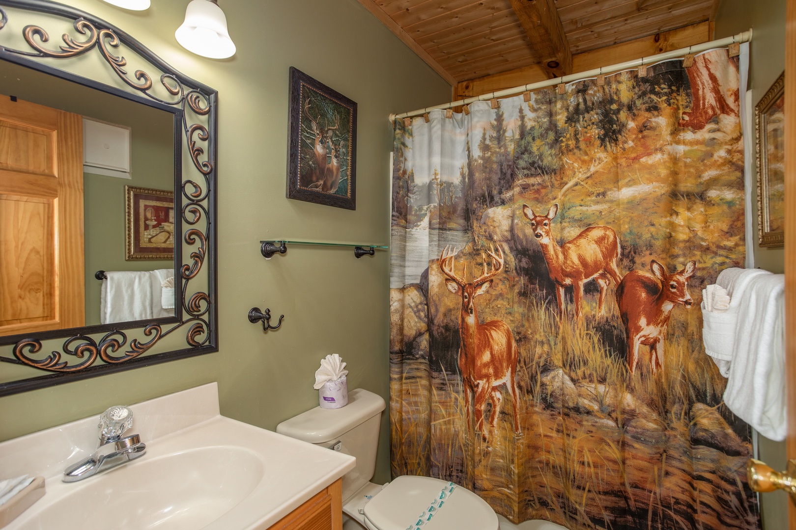 Bathroom with a tub and shower at Alpine Romance, a 2 bedroom cabin rental located in Pigeon Forge