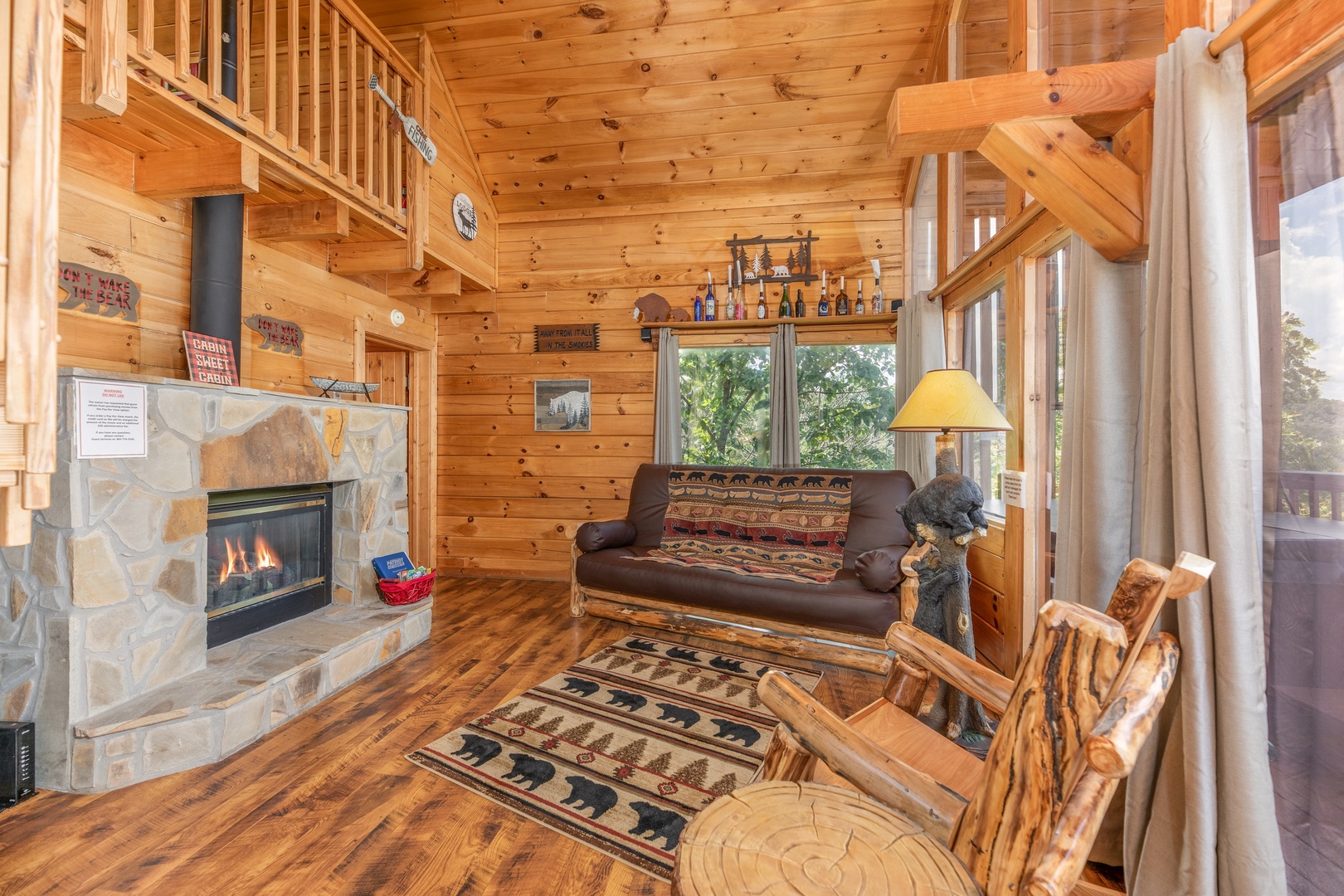 Fireplace in the living room at Away From it All, a 1 bedroom cabin rental located in Pigeon Forge