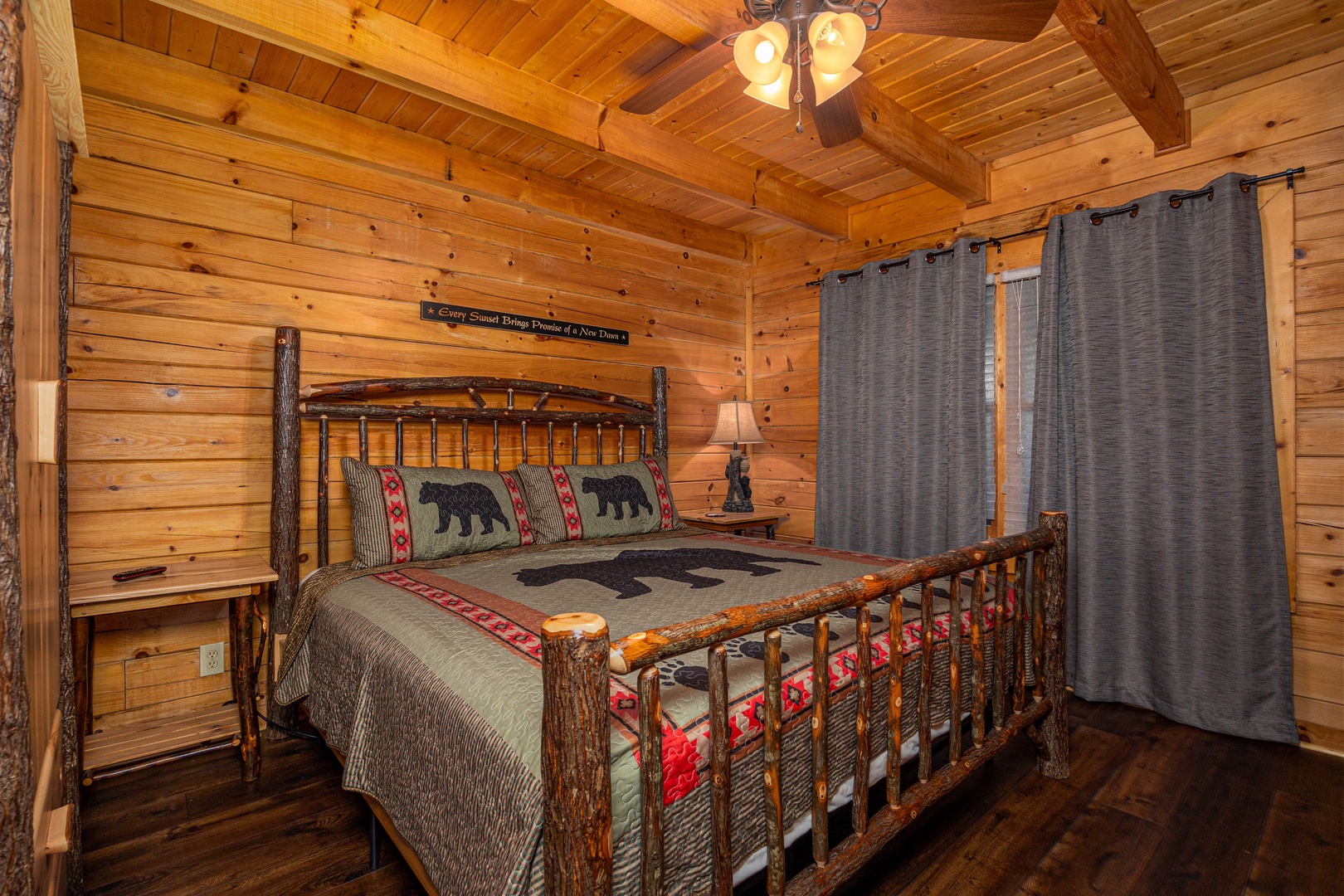 Log Bed at Eagle's Nest, a 2 bedroom cabin rental located in Sevierville