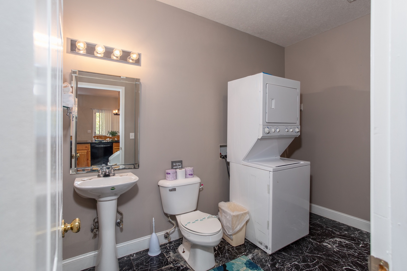 Bathroom with a laundry facility at Into the Woods, a 3 bedroom cabin rental located in Pigeon Forge