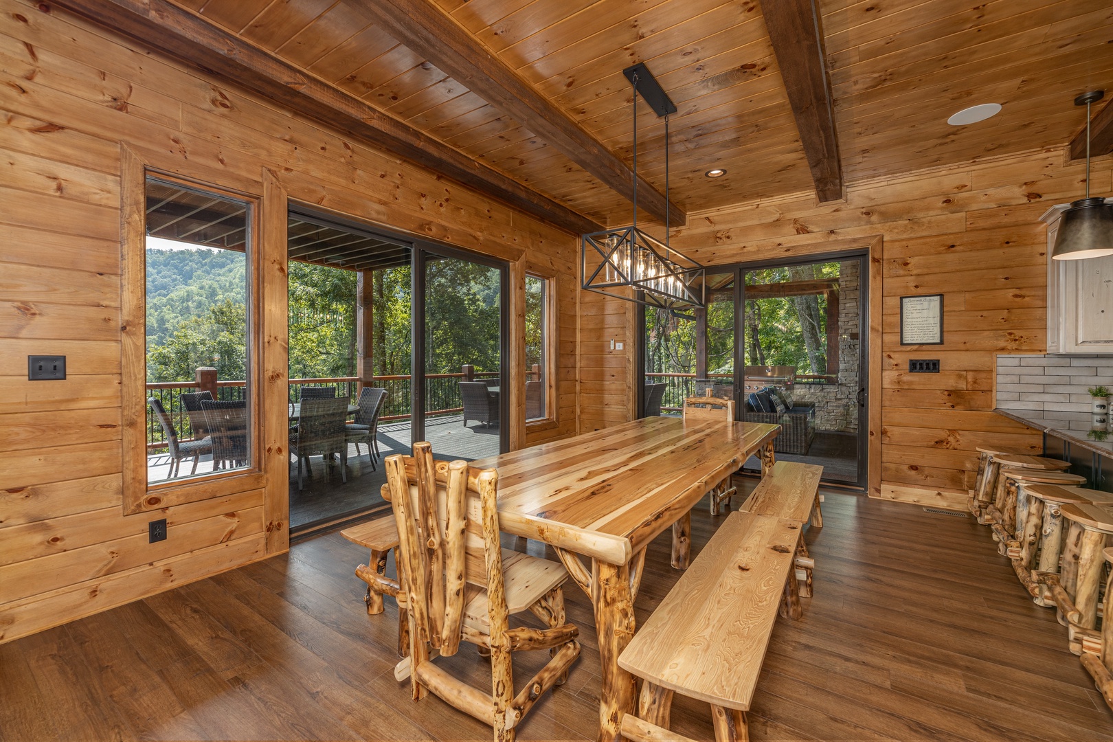 Large dining table at Black Bears & Biscuits Lodge, a 6 bedroom cabin rental located in Pigeon Forge
