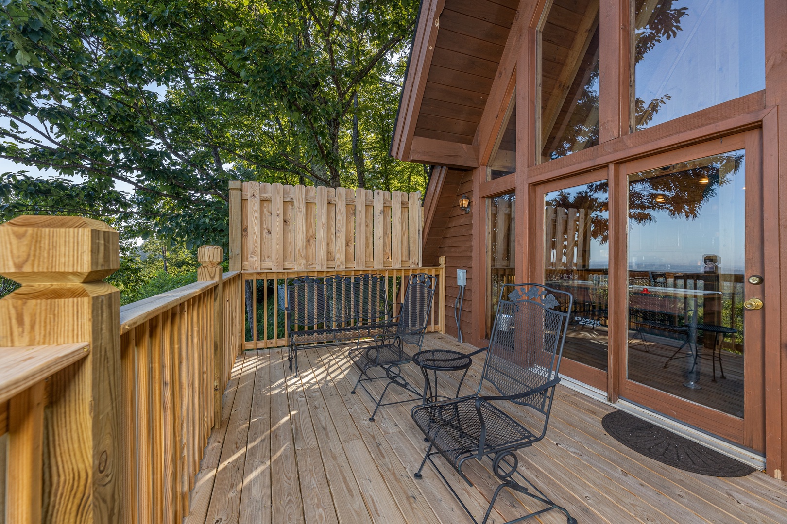 Deck seating at Cozy Mountain View, a 1 bedroom cabin rental located in Pigeon Forge