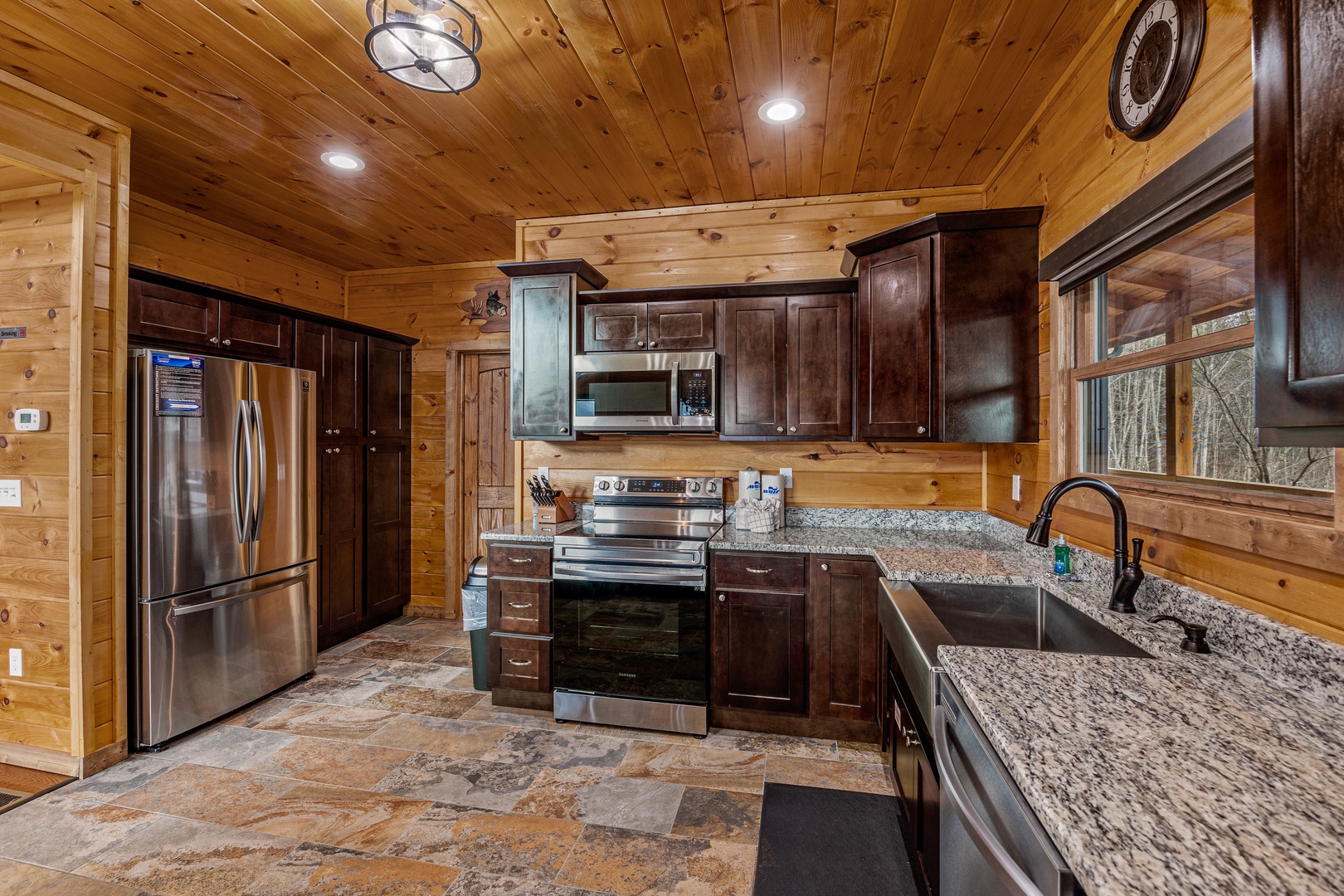 Refrigerator and lighting at Four Seasons Grand, a 5 bedroom cabin rental located in Pigeon Forge