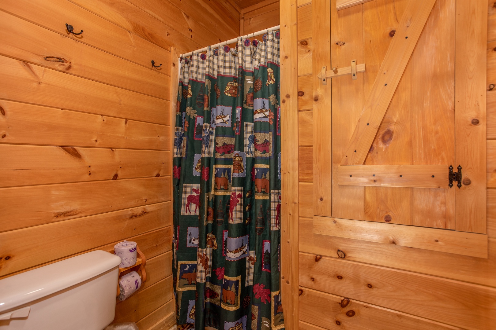 Bathroom with a separate shower at Bearly in the Mountains, a 5-bedroom cabin rental located in Pigeon Forge