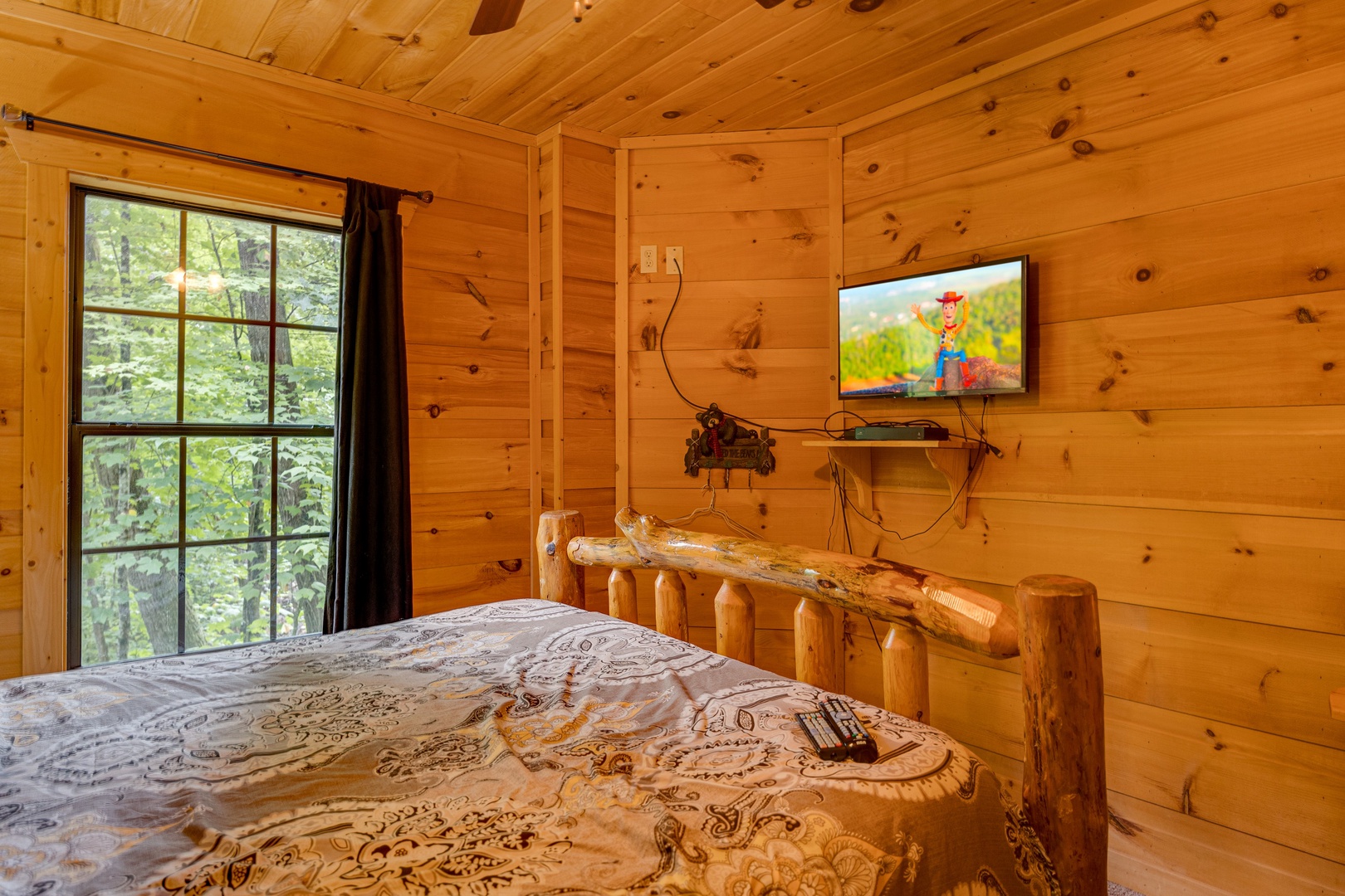 Bedroom flat screen at Lazy Bear Lodge