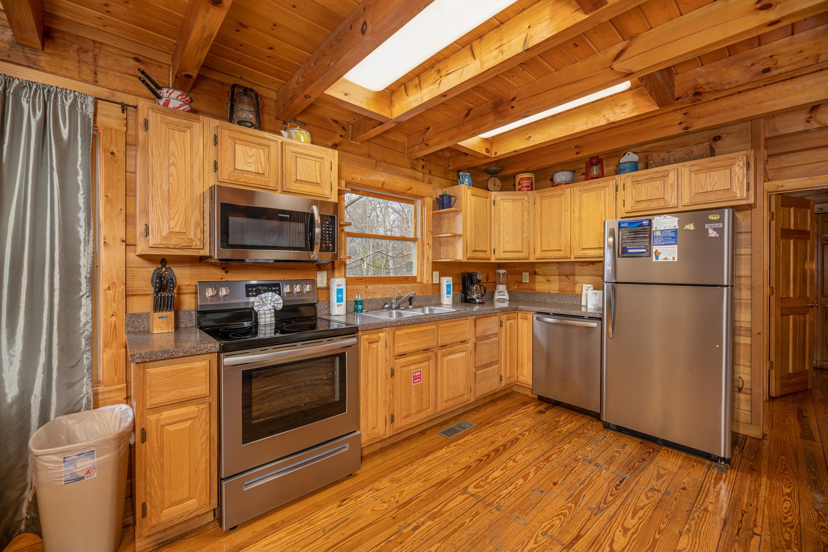 Kitchen with stainless appliances at Fox Ridge, a 3 bedroom cabin rental located in Pigeon Forge