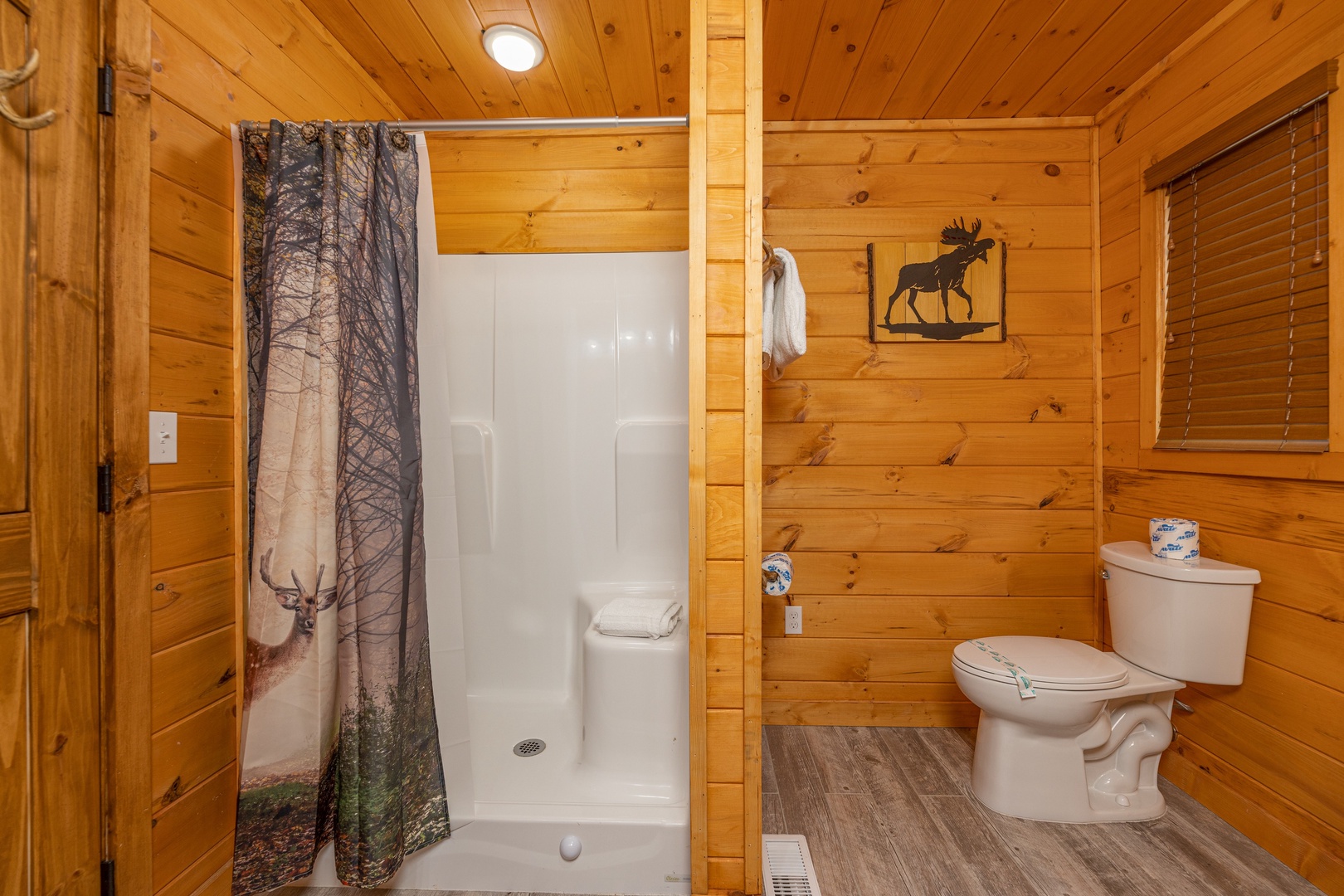 Walk in shower in a bathroom at J's Hideaway, a 4 bedroom cabin rental located in Pigeon Forge