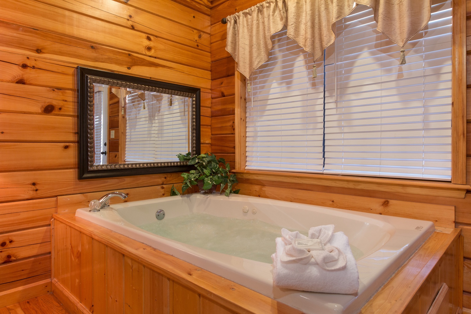 Jacuzzi at A Beary Cozy Escape, a 1 bedroom cabin rental located in Pigeon Forge