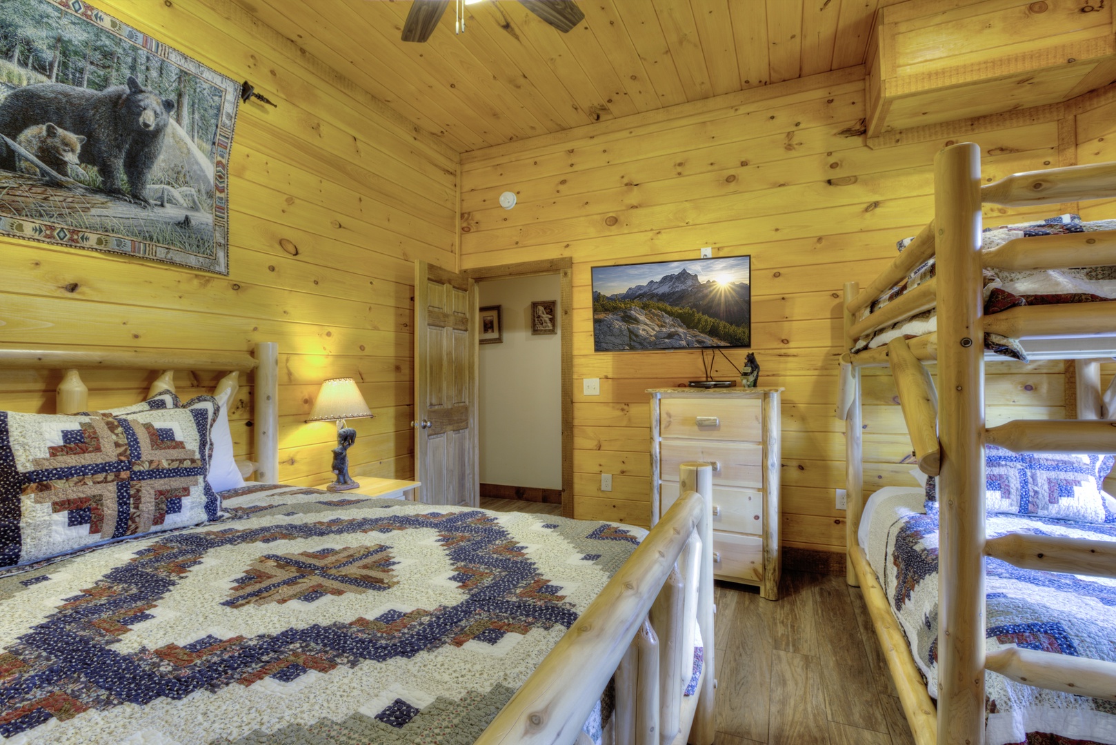 Log furniture in the bedroom at The Best View Lodge, a 5 bedroom cabin rental located in gatlinburg