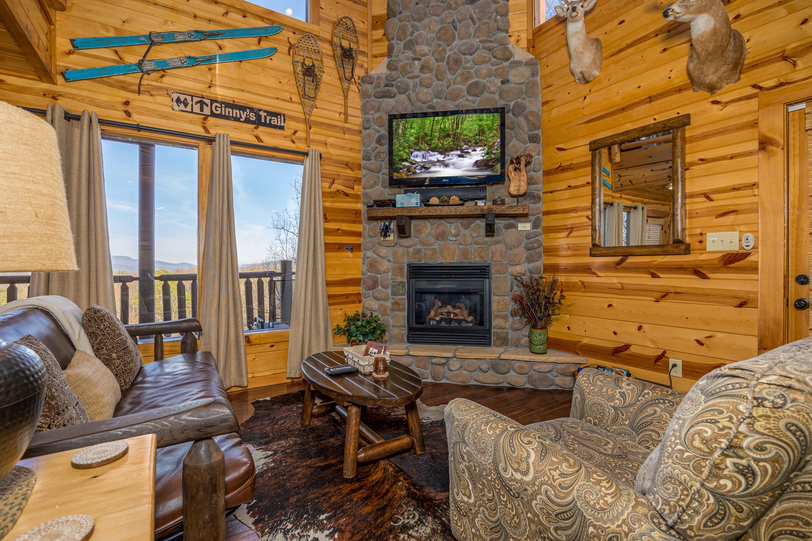 Stone fireplace at Gone To Therapy, a 2 bedroom cabin rental located in Gatlinburg