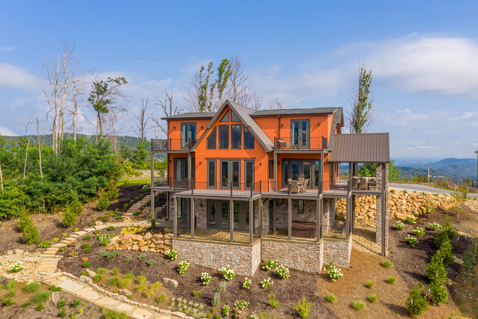 Rear exterior at Mountain Celebration, a 4 bedroom cabin rental located in Gatlinburg