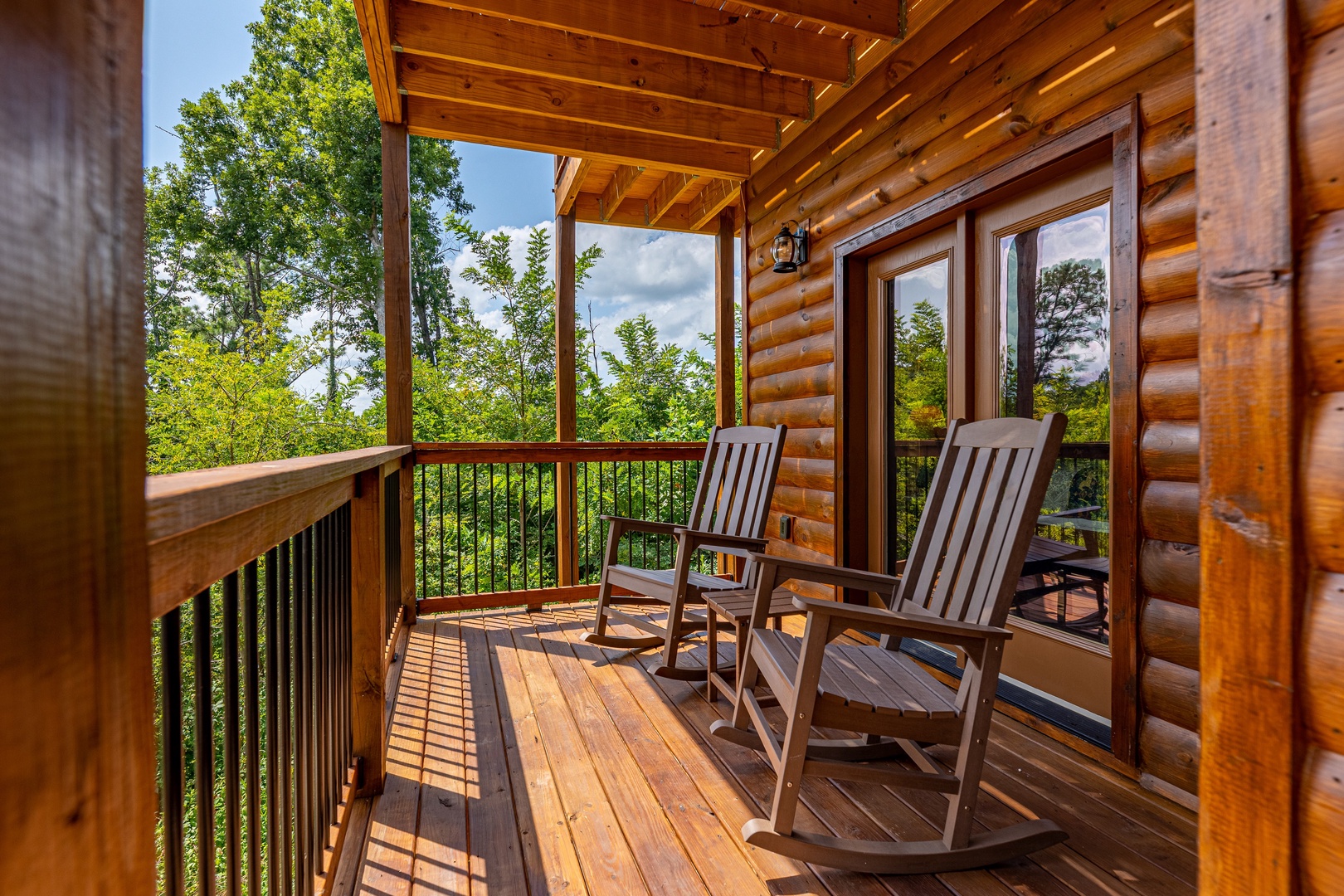 Matching rockers on deck at Twin Peaks, a 5 bedroom cabin rental located in Gatlinburg