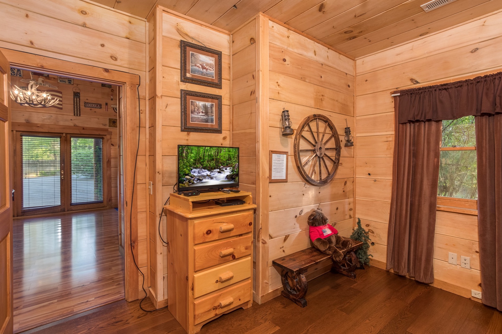 Dresser and TV in the bunk room at Patriot Pointe, a 5 bedroom cabin rental located in Pigeon Forge