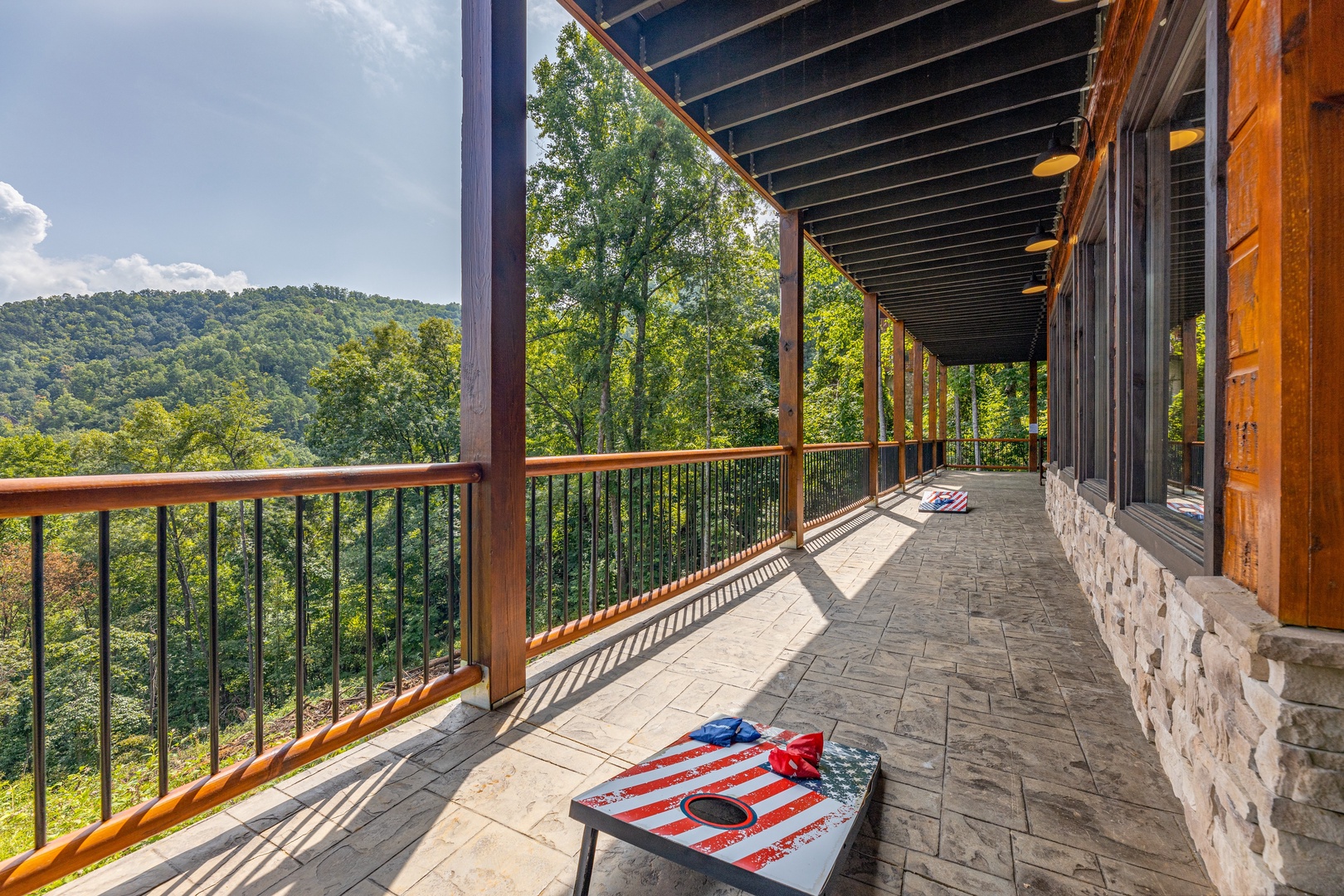 Cornhole game at Black Bears & Biscuits Lodge, a 6 bedroom cabin rental located in Pigeon Forge