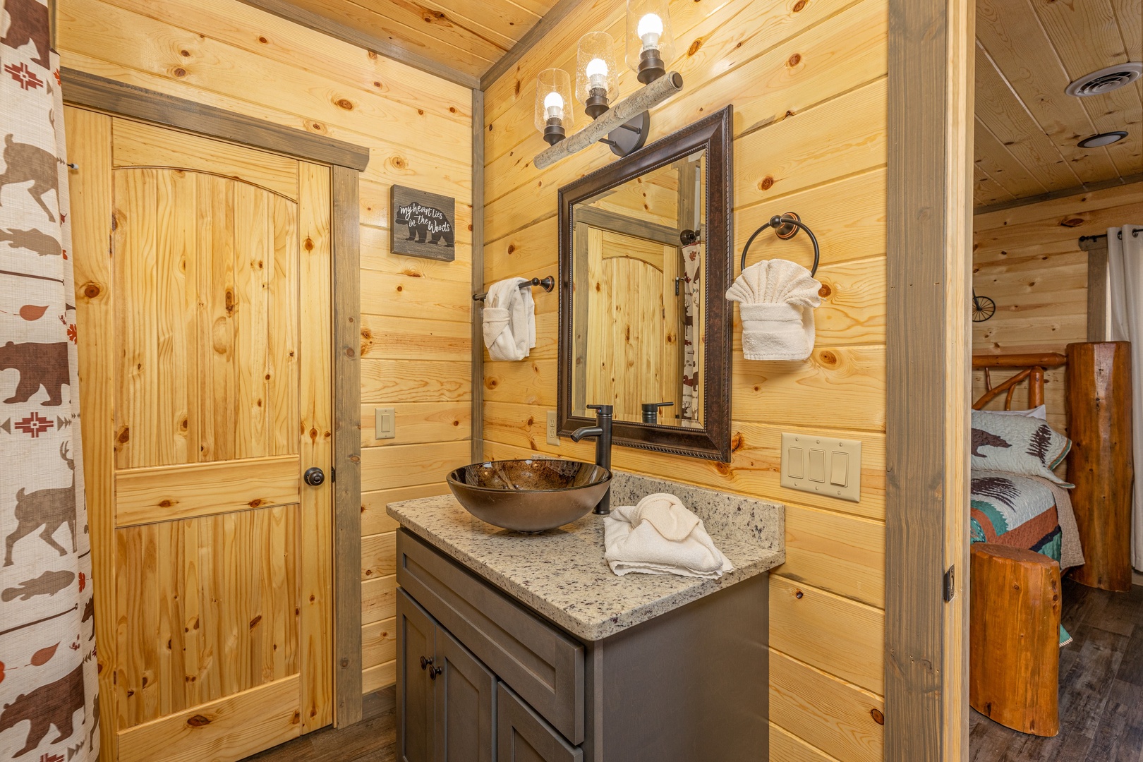Vanity in a bathroom at Everly's Splash, a 4 bedroom cabin rental located in Pigeon Forge