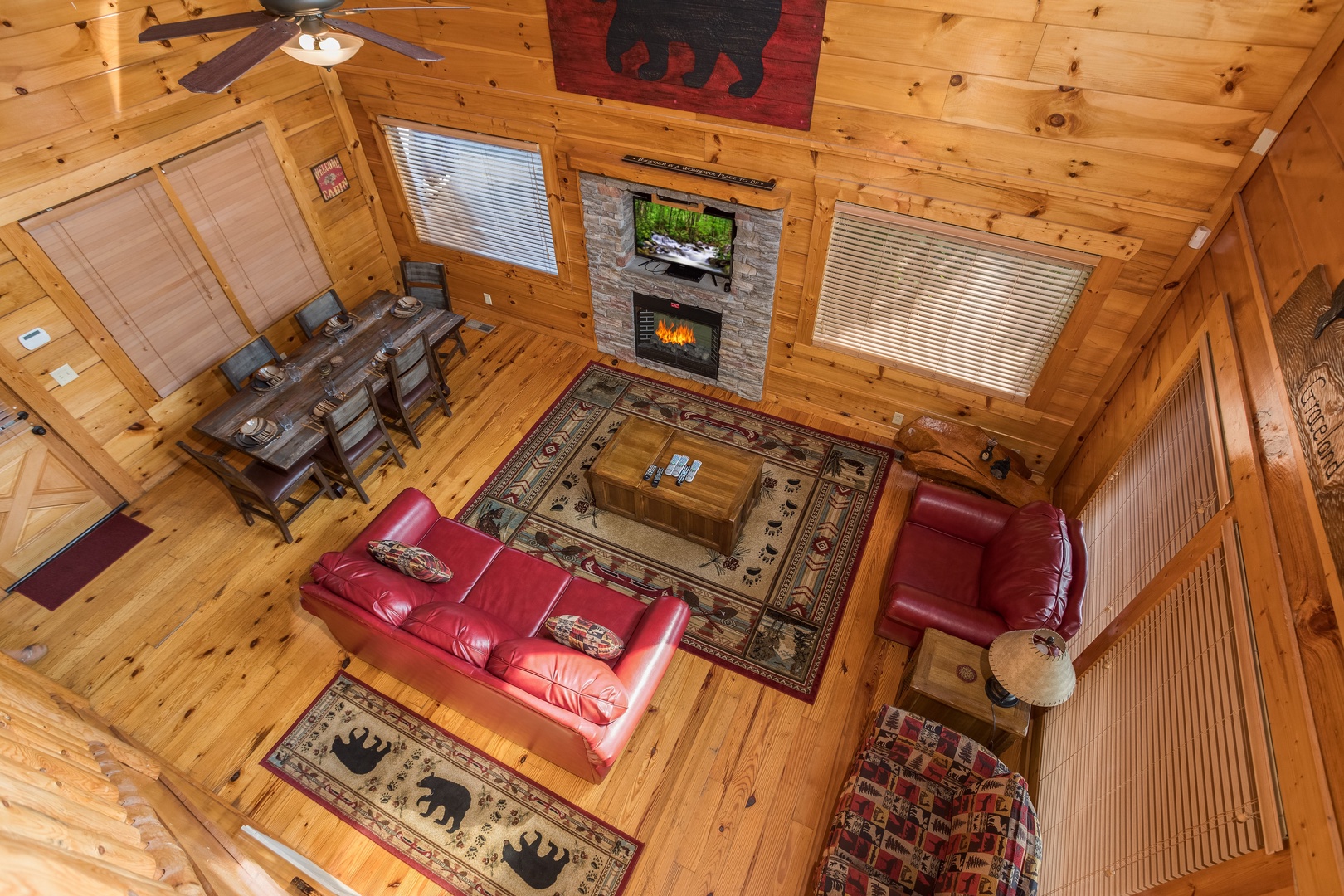 Looking down at the living room at Graceland, a 4-bedroom cabin rental located in Pigeon Forge