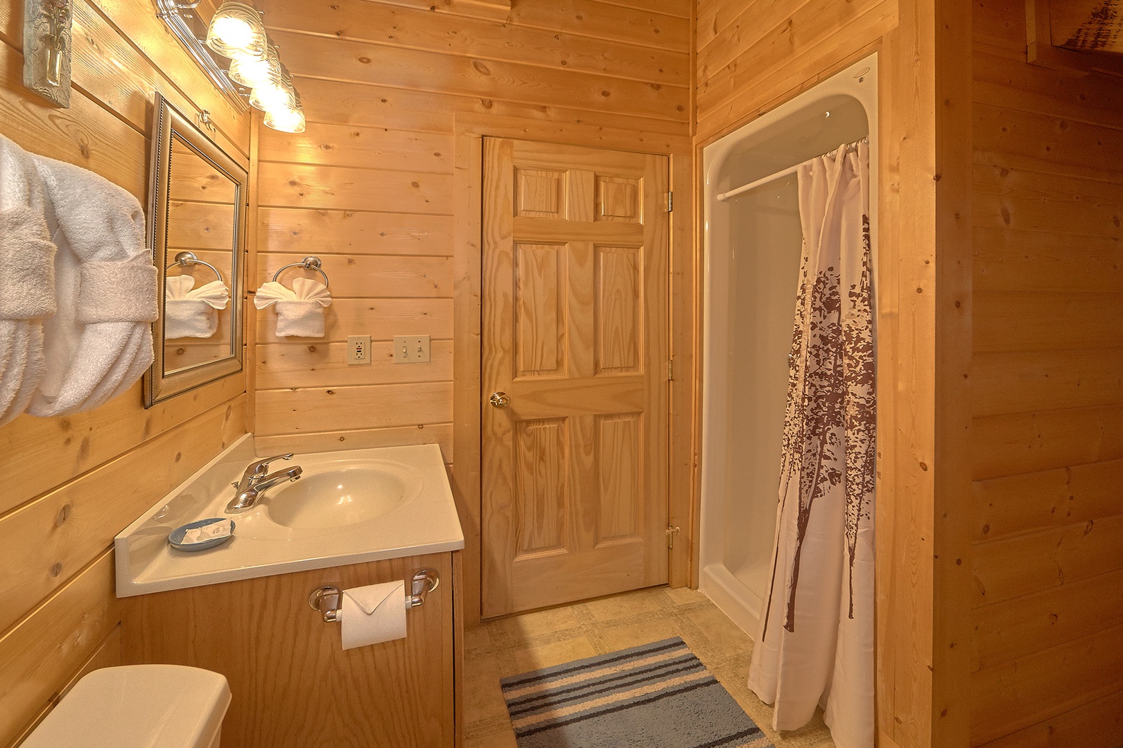 Bathroom with a walk in shower at A Place to Remember, a 2 bedroom cabin rental located in Gatlinburg