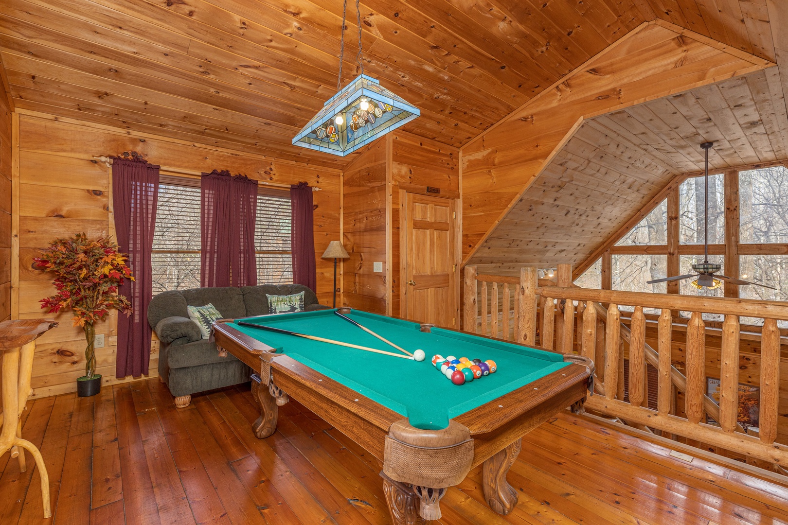 Pool table in the loft at Fallin' in Love, a 1 bedroom cabin rental located in Gatlinburg