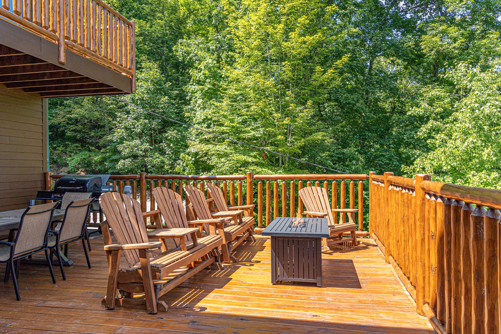 Deck firepit and seating at Sky View, A 4 bedroom cabin rental in Pigeon Forge